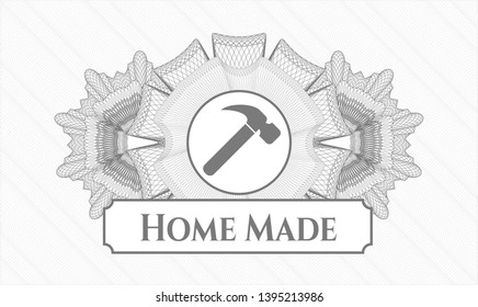 Grey linear rosette with hammer icon and Home Made text inside
