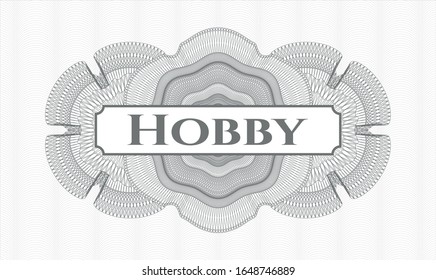 Grey linear rosette with text Hobby inside