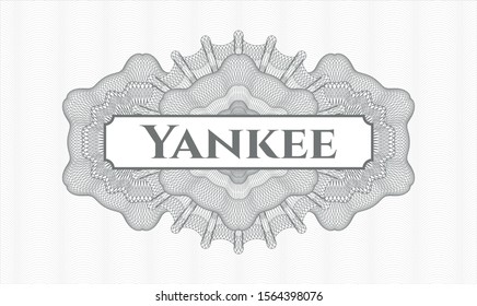 Grey linear rosette with text Yankee inside