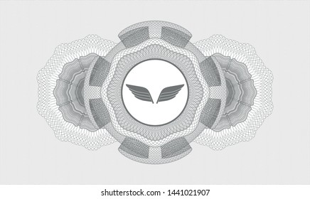 Grey linear rosette with wings icon inside