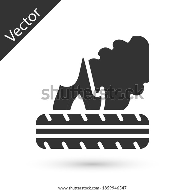Grey Lying burning tires icon isolated on white\
background. Vector.
