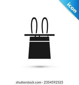 Grey Magician hat and rabbit ears icon isolated on white background. Magic trick. Mystery entertainment concept.  Vector Illustration