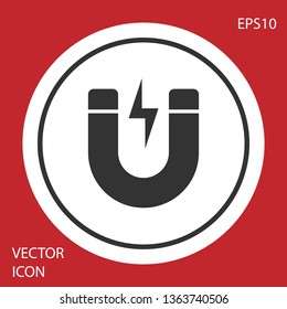 Grey Magnet with lightning icon isolated on red background. Horseshoe magnet, magnetism, magnetize, attraction sign. White circle button. Vector Illustration