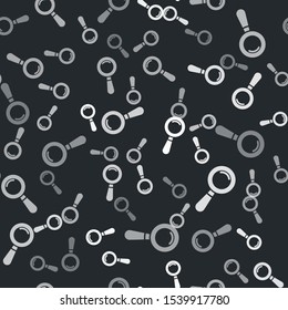 Grey Magnifying glass icon isolated seamless pattern on black background. Search, focus, zoom, business symbol.  Vector Illustration