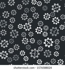Grey Maintenance symbol - wrench and screwdriver in gear icon isolated seamless pattern on black background. Service tool symbol.  Vector Illustration