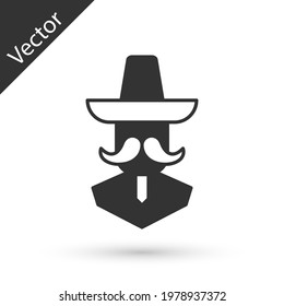 Grey Mexican man wearing sombrero icon isolated on white background. Hispanic man with a mustache.  Vector