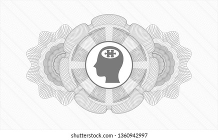 Grey money style emblem or rosette with head with jigsaw puzzle piece icon inside