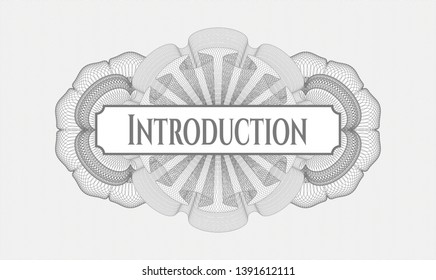 Grey money style emblem or rosette with text Introduction inside