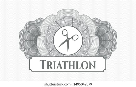 Grey money style emblem or rosette with scissors icon and Triathlon text inside