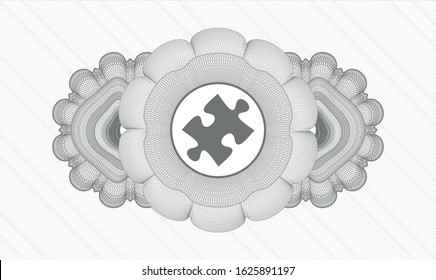 Grey money style emblem or rosette with jigsaw puzzle piece icon inside