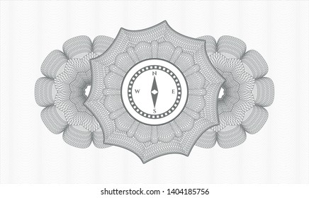 Grey money style rosette with compass icon inside