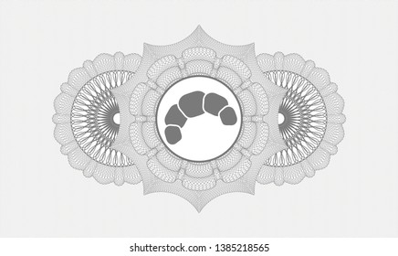 Grey money style rosette with croissant icon inside
