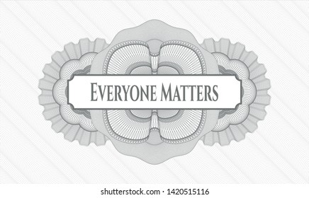 Grey money style rosette with text Everyone Matters inside