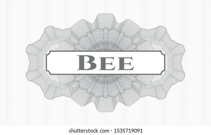 Grey money style rosette with text Bee inside