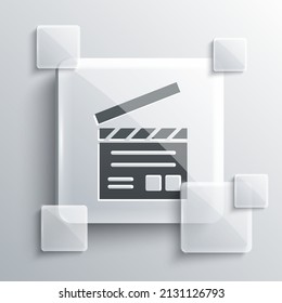 Grey Movie clapper icon isolated on grey background. Film clapper board. Clapperboard sign. Cinema production or media industry. Square glass panels. Vector Illustration