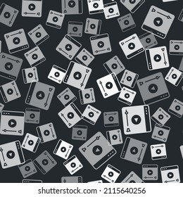 Grey Online play video icon isolated seamless pattern on black background. Film strip with play sign.  Vector