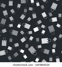 Grey Paper shopping bag icon isolated seamless pattern on black background. Package sign. Vector Illustration