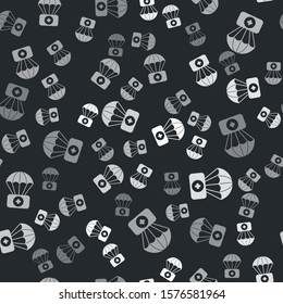 Grey Parachute with first aid kit icon isolated seamless pattern on black background. Medical insurance.  Vector Illustration