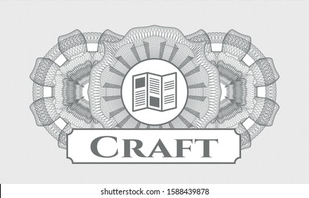 Grey passport money rosette with brochure icon and Craft text inside