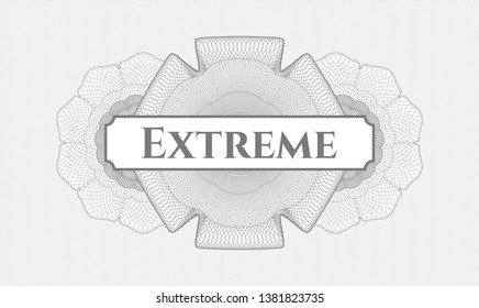 Grey passport money rosette with text Extreme inside