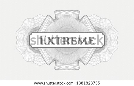 Grey passport money rosette with text Extreme inside