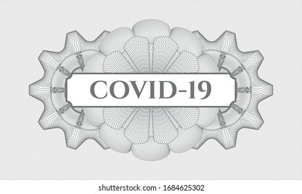 Grey passport money style rosette with text COVID-19 inside