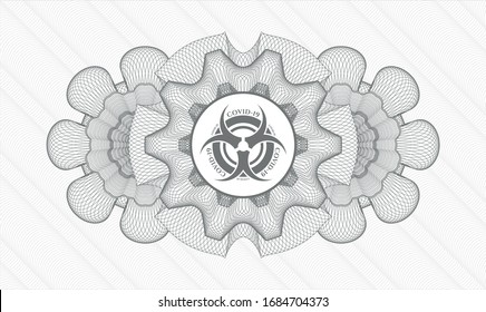 Grey passport money style rosette with biohazard covid-19 icon inside