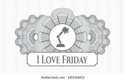 Grey passport rosette with desk lamp icon and I Love Friday text inside