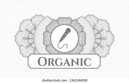 Grey passport rosette with microphone icon and Organic text inside