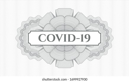 Grey passport rosette with text COVID-19 inside