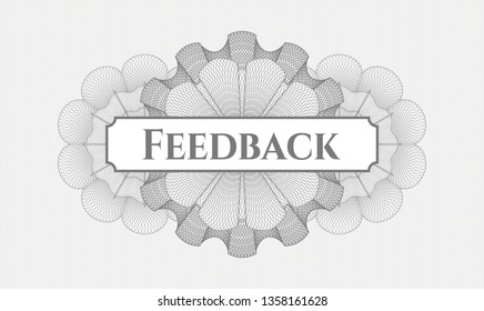 Grey passport rosette with text Feedback inside
