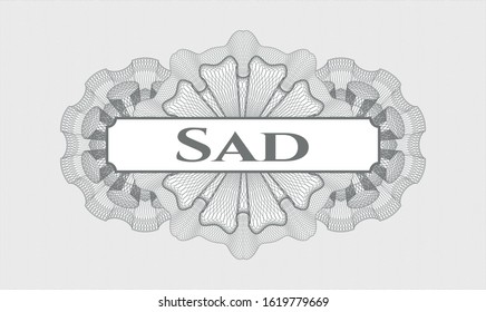 Grey passport rosette with text Sad inside