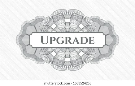 Grey passport rosette with text Upgrade inside