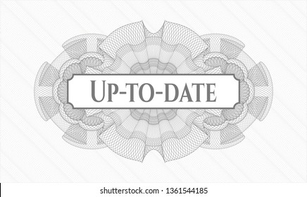 Grey passport rosette with text Up-to-date inside