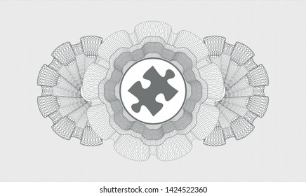 Grey passport style rosette with jigsaw puzzle piece icon inside