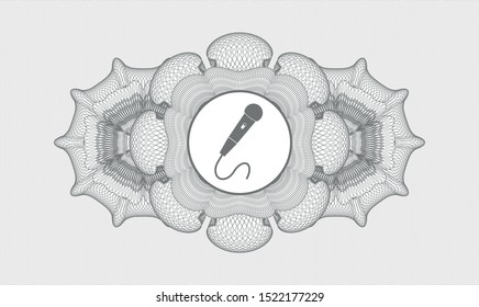 Grey passport style rosette with microphone icon inside