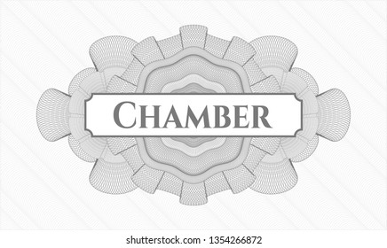 Grey passport style rosette with text Chamber inside
