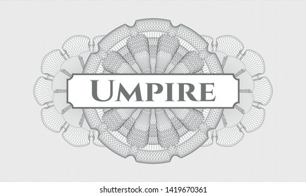 Grey passport style rosette with text Umpire inside