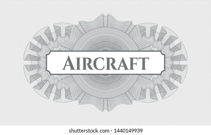 Grey passport style rosette with text Aircraft inside