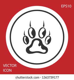 Grey Paw print icon isolated on red background. Dog or cat paw print. Animal track. White circle button. Vector Illustration