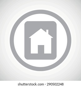 Grey plate with house image in circle, on white gradient background