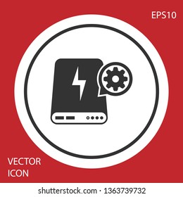 Grey Power bank and gear icon isolated on red background. Adjusting app, service concept, setting options, maintenance, repair, fixing. White circle button. Vector Illustration