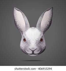 Grey rabbit portrait low poly. Side light source. Abstract polygonal illustration.