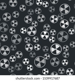 Grey Radioactive icon isolated seamless pattern on black background. Radioactive toxic symbol. Radiation Hazard sign.  Vector Illustration