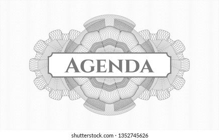 Grey rosette (money style emblem) with text Agenda inside
