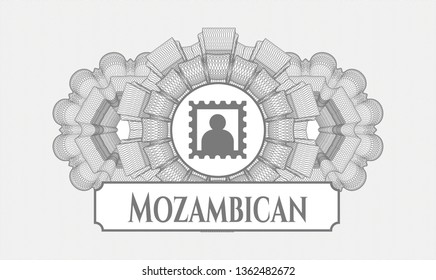 Grey rosette (money style emblem) with picture icon and Mozambican text inside