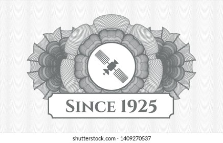 Grey rosette (money style emblem) with satelite icon and Since 1925 text inside