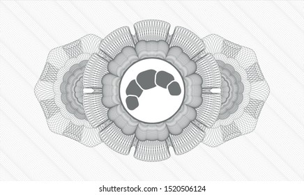 Grey rosette (money style emblem) with croissant icon inside