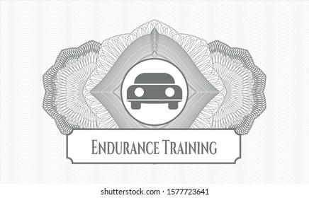 Grey rosette (money style emblem) with car seen from front icon and Endurance Training text inside