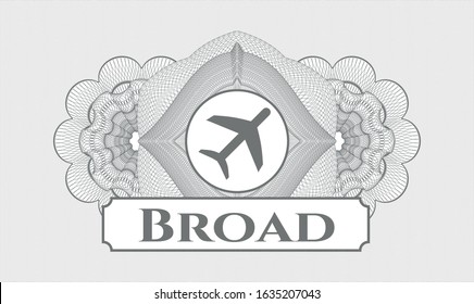 Grey rosette (money style emblem) with plane icon and Broad text inside